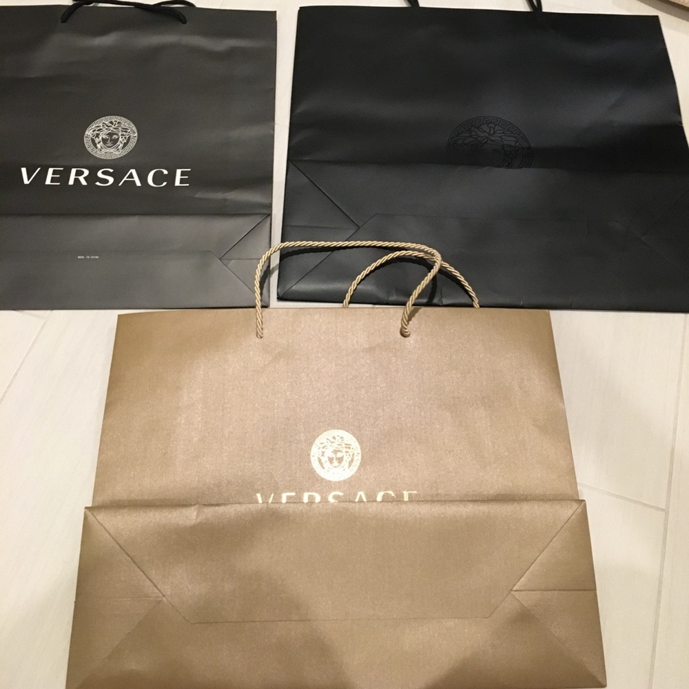 SOLD!!! 3different colors and sizesof Versace